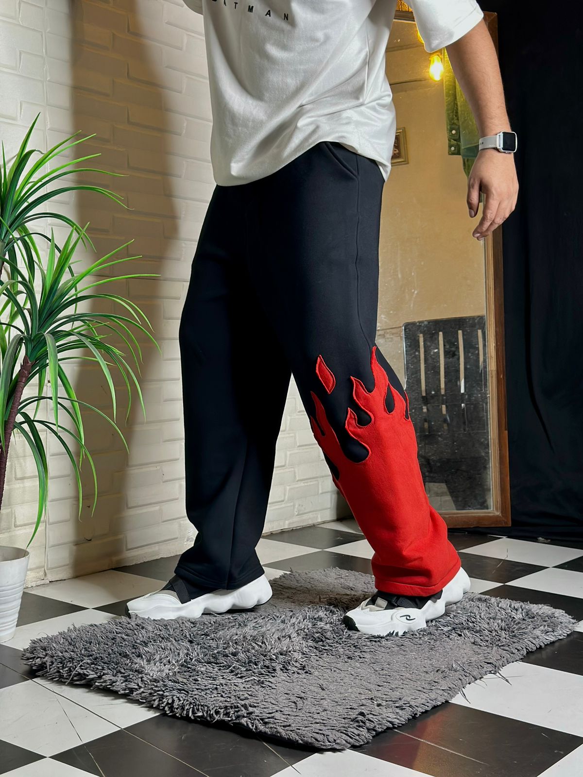 Folded Fire Kick Bottom Pant showing thick 240+ GSM interlock cotton and flame design

