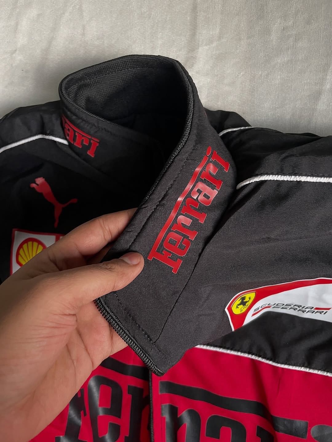 black-f1-ferrari-jacket-close-view